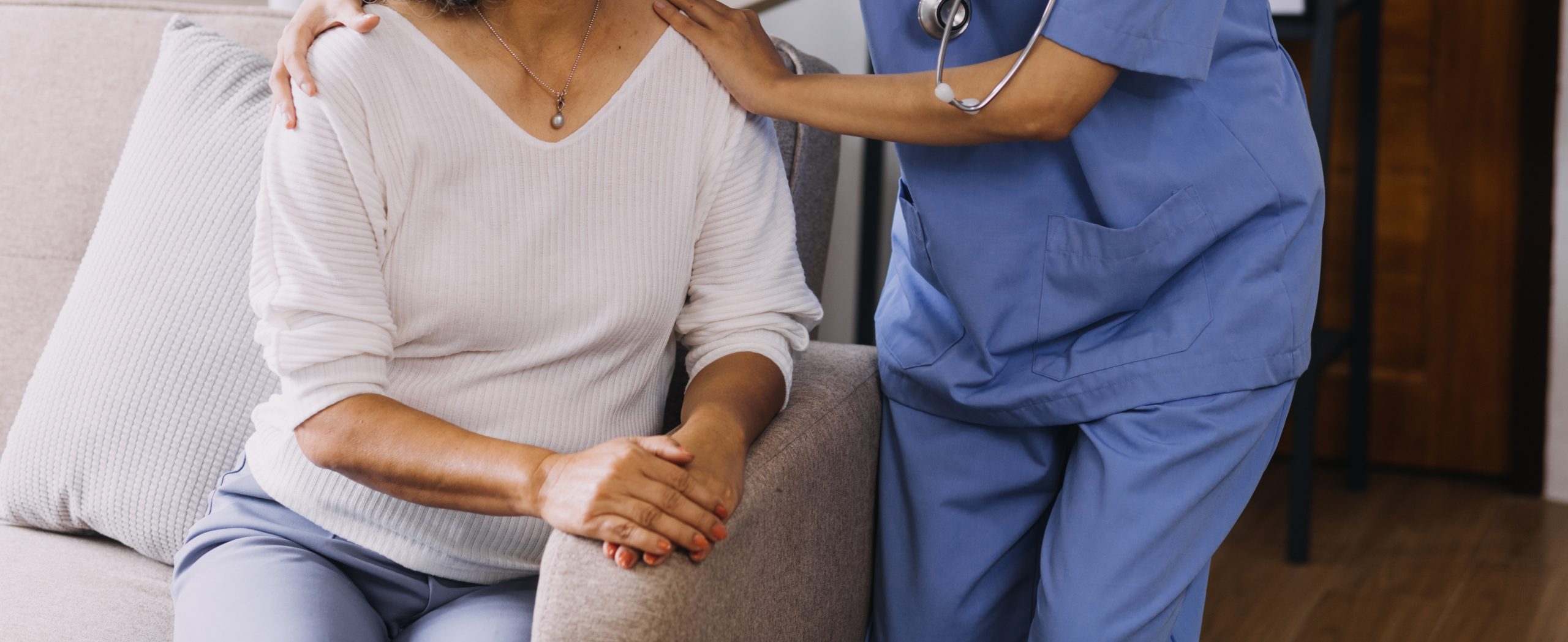 Caring nurse holding
