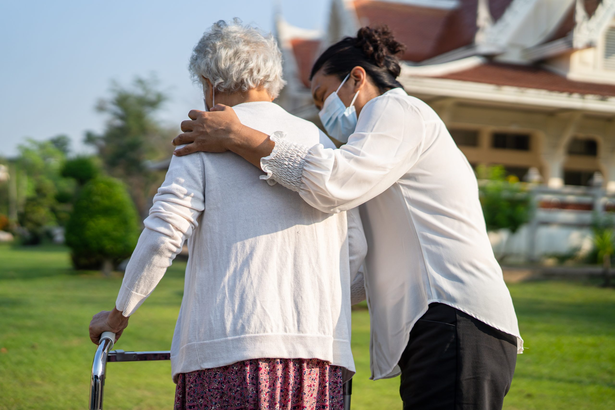 Caring nurse holding